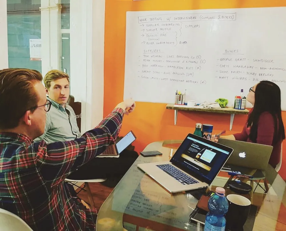 Reviewing whiteboard Sam Dickie